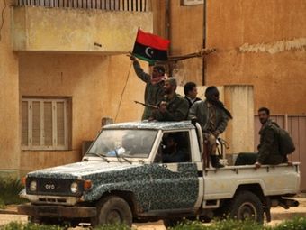 Ливию продолжают бомбить, ЛАГ осуждает, а оппозиция подсчитывает свои потери.