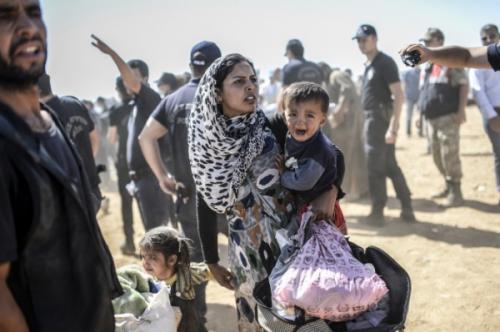 ЕС выделит €1,4 млрд для помощи беженцам в Турции